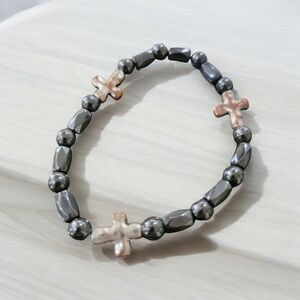 Black and copper cross bracelet